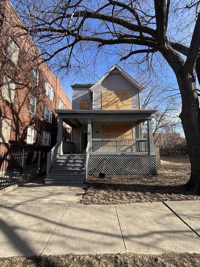 view of front of property featuring covered porch