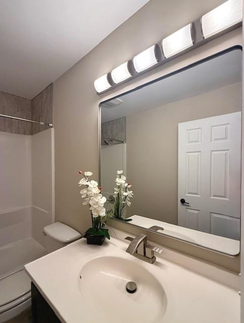 1816 Sadler Dr, Champaign, IL 61821 - bathroom with toilet, vanity, and bathtub / shower combination