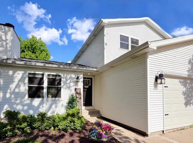 1816 Sadler Dr, Champaign, IL 61821 - view of front of home with a garage