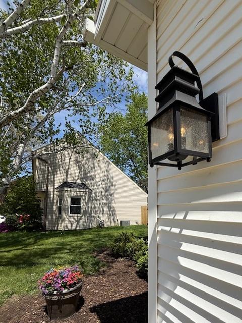 1816 Sadler Dr, Champaign, IL 61821 - view of side of home with a yard
