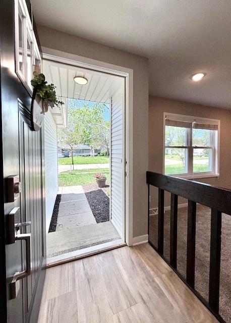 1816 Sadler Dr, Champaign, IL 61821 - entryway featuring baseboards, light wood finished floors, and recessed lighting