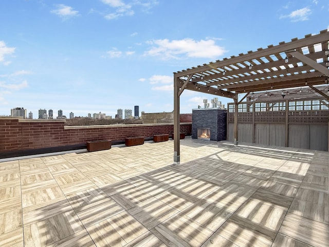 view of patio with a view of city and a pergola