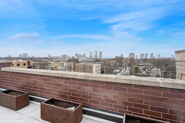 balcony featuring a city view