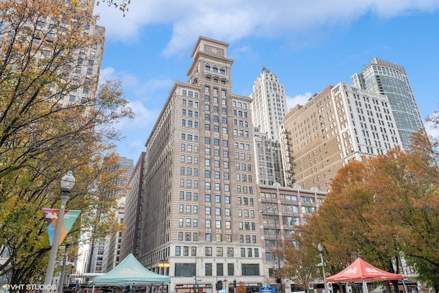 view of property with a city view