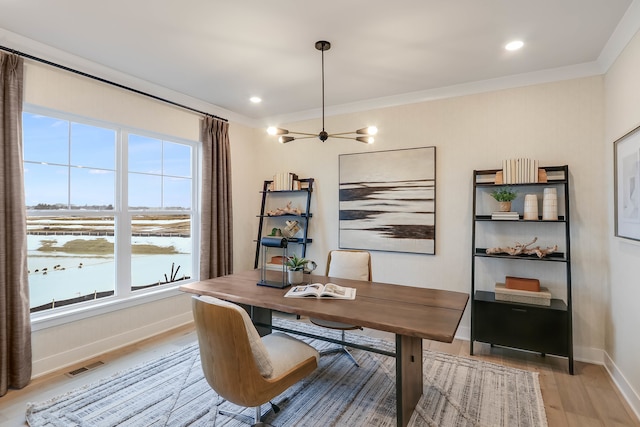 home office featuring recessed lighting, visible vents, baseboards, light wood finished floors, and crown molding