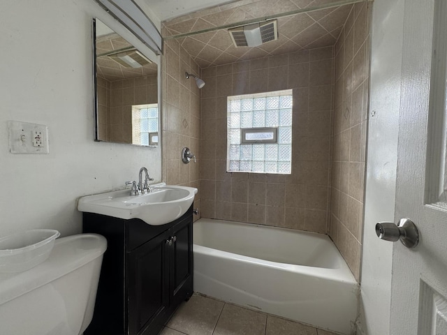 full bath with visible vents, toilet, vanity, shower / tub combination, and tile patterned flooring