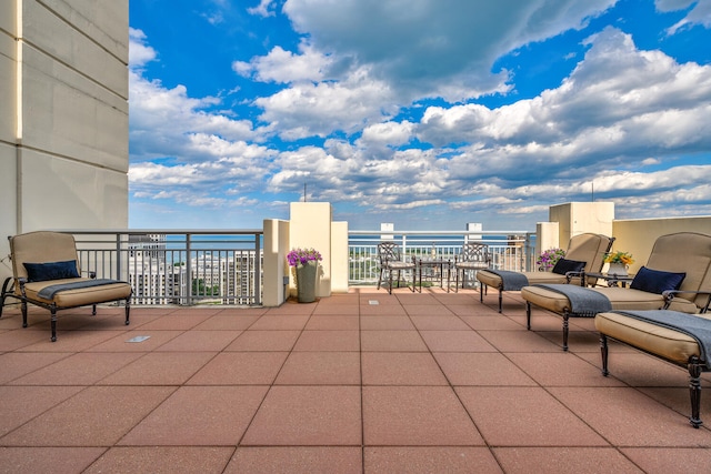 view of patio / terrace with a balcony