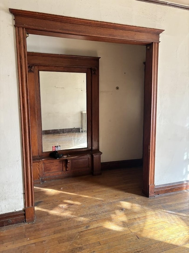 hall with dark wood-style floors