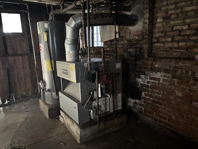 utility room with gas water heater