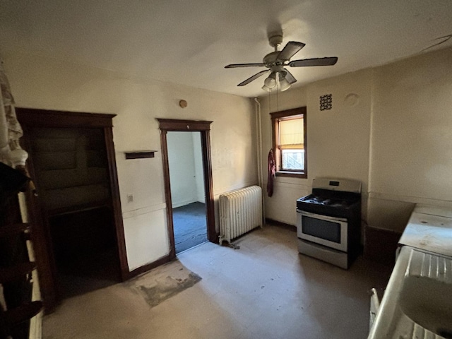 kitchen with concrete floors, visible vents, a ceiling fan, electric stove, and radiator heating unit