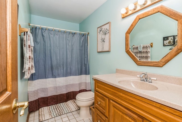 full bathroom featuring tile patterned flooring, a shower with shower curtain, vanity, and toilet