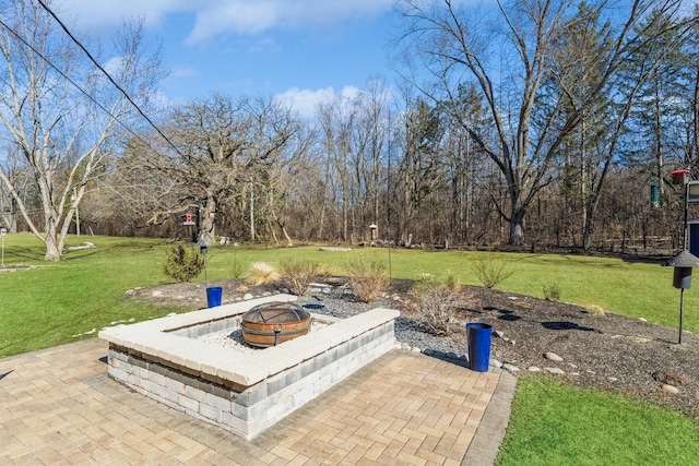 view of patio / terrace featuring a fire pit