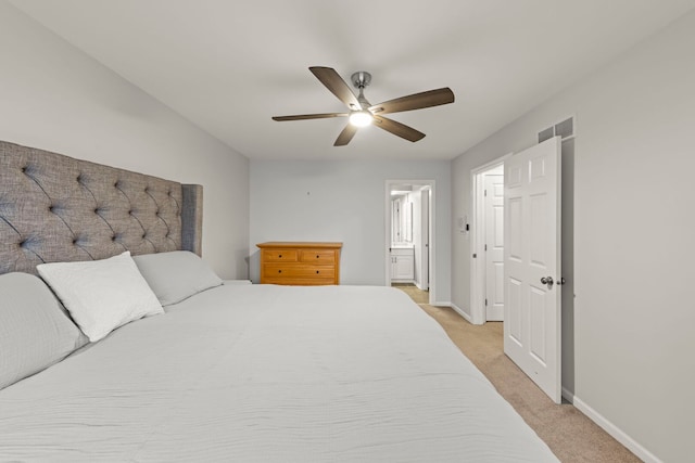 bedroom with light carpet, baseboards, visible vents, a ceiling fan, and connected bathroom