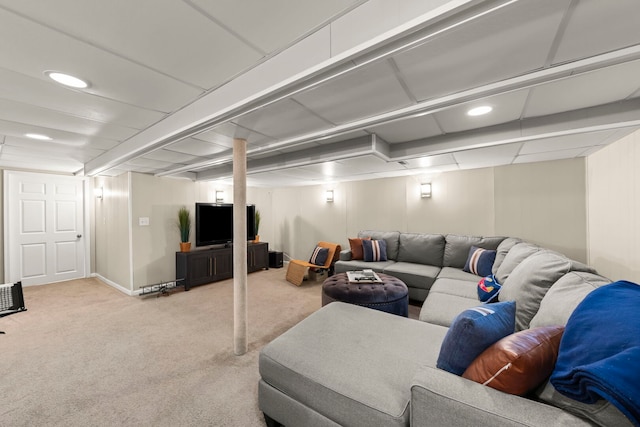 living room with light carpet, baseboards, and recessed lighting