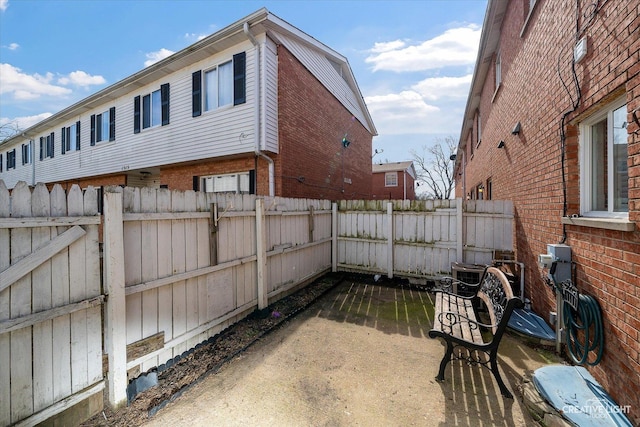 view of patio featuring a fenced backyard