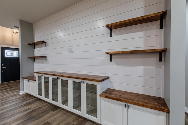 mudroom with dark wood-type flooring