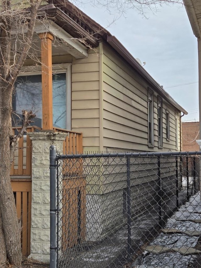 view of side of property with fence