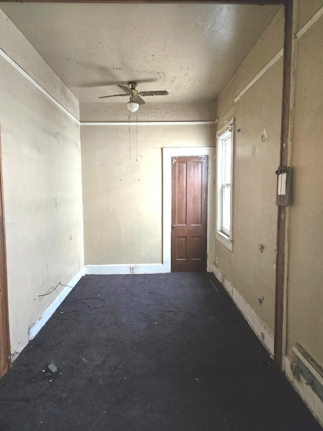 unfurnished room with ceiling fan