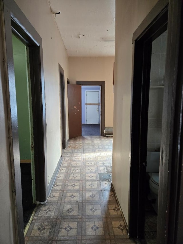 corridor with tile patterned floors