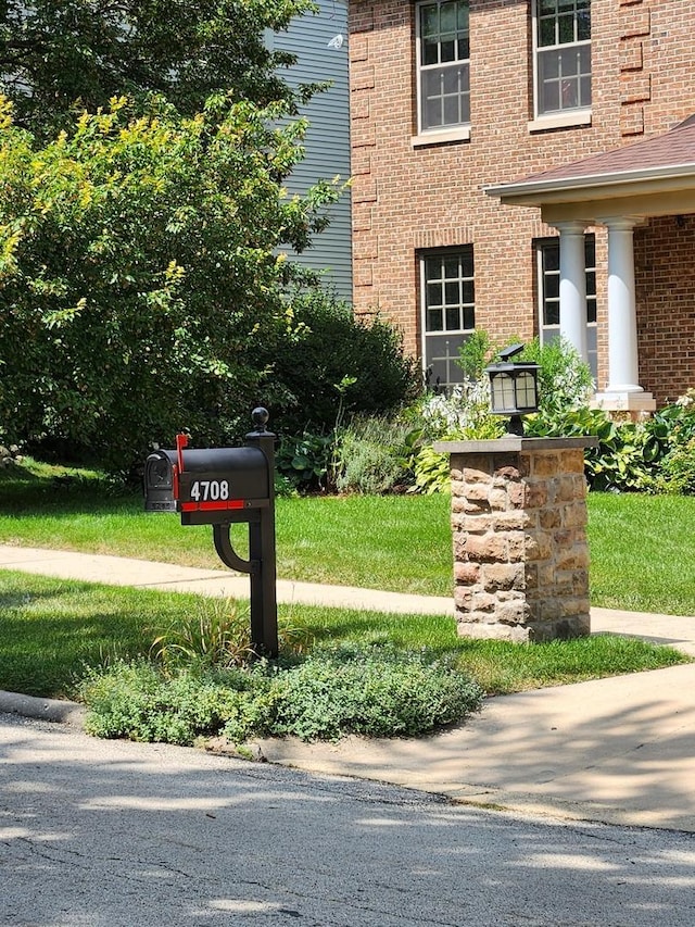 exterior space with brick siding