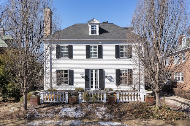 2252 Orrington Ave, Evanston, IL 60201 - view of front of home with french doors and a chimney