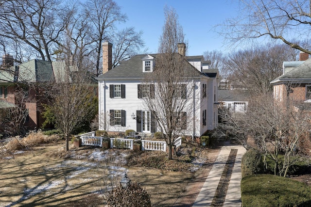 2252 Orrington Ave, Evanston, IL 60201 - view of front of property with french doors and a chimney