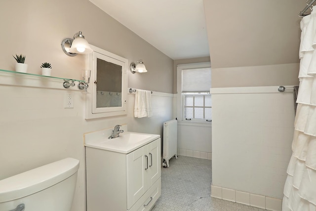 2252 Orrington Ave, Evanston, IL 60201 - bathroom featuring vanity, toilet, radiator heating unit, and tile patterned flooring
