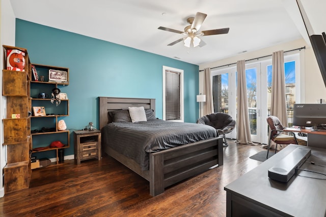 bedroom with a ceiling fan, access to outside, and dark wood-style flooring