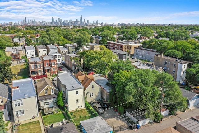 birds eye view of property with a view of city