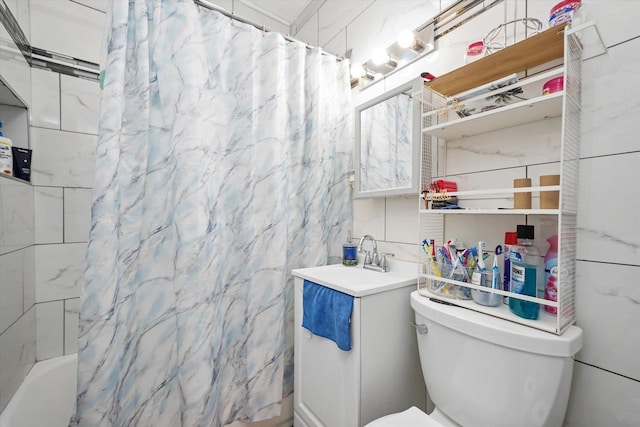 full bath with shower / bathtub combination with curtain, tile walls, toilet, and vanity