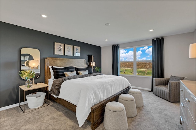 bedroom featuring recessed lighting, baseboards, and light colored carpet