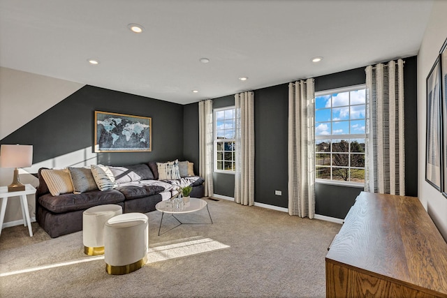 interior space with light carpet, baseboards, and recessed lighting