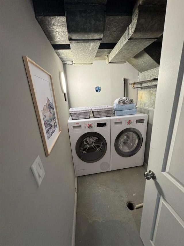 laundry area featuring laundry area and separate washer and dryer