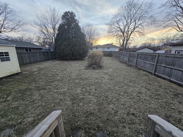 view of yard featuring a fenced backyard