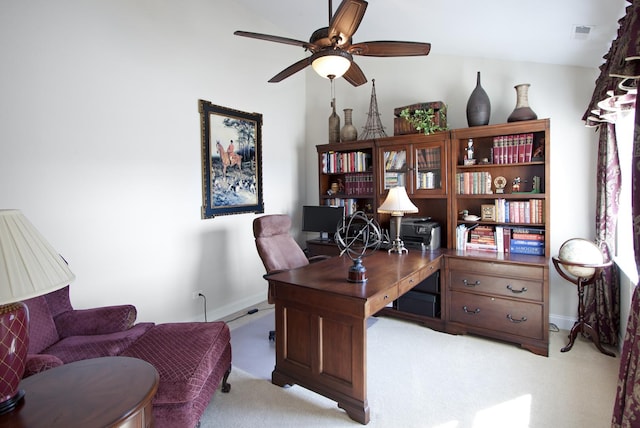 office area featuring light carpet, ceiling fan, visible vents, and baseboards