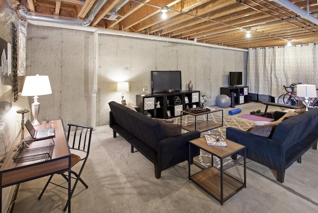 living room featuring concrete flooring