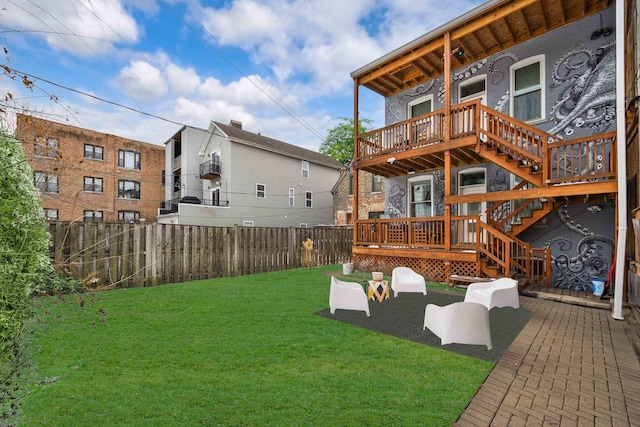 view of yard featuring a deck and a fenced backyard