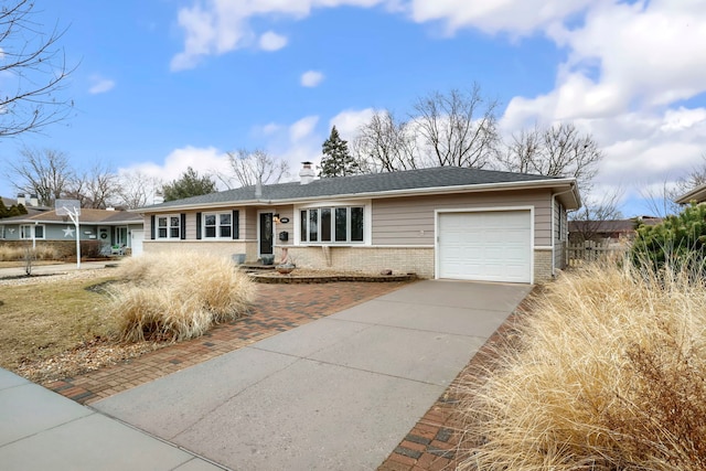 single story home featuring driveway, a shingled roof, a chimney, an attached garage, and brick siding