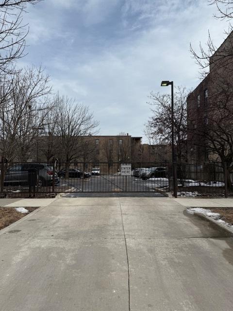 view of street featuring a gate