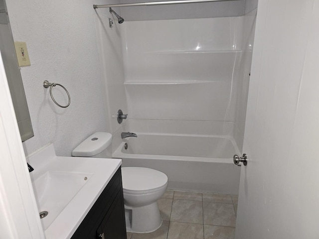 full bath featuring shower / bath combination, a textured wall, toilet, vanity, and tile patterned floors