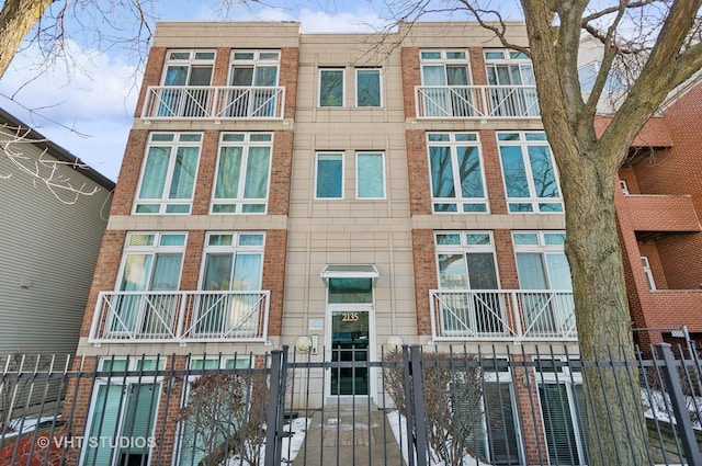 view of property featuring a fenced front yard