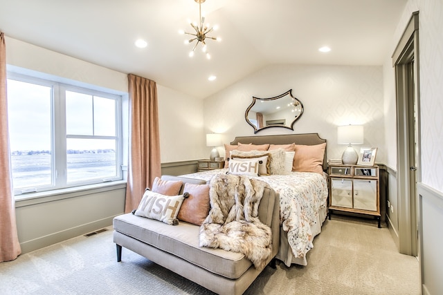 bedroom featuring light carpet, lofted ceiling, visible vents, and a notable chandelier