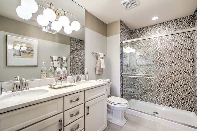 full bath with a shower stall, visible vents, and a sink