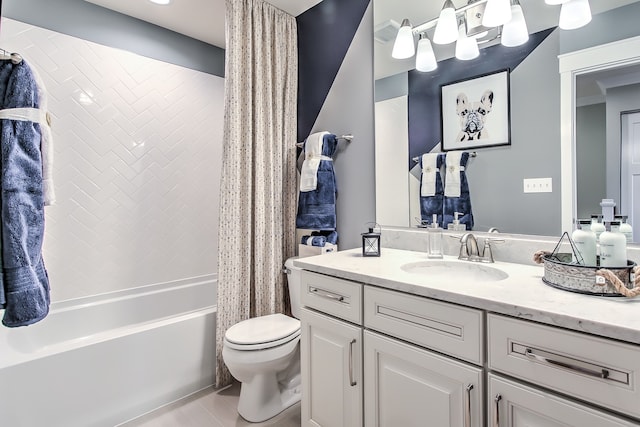 bathroom featuring shower / bath combination with curtain, vanity, toilet, and tile patterned floors