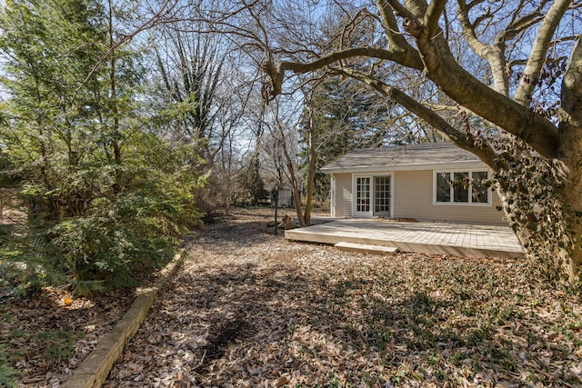 view of yard featuring a wooden deck