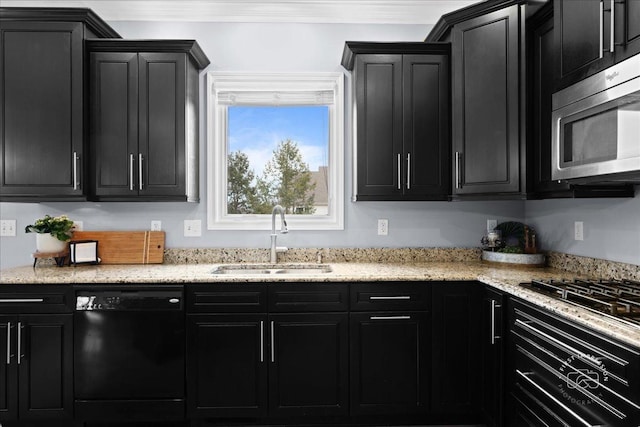 kitchen with black dishwasher, stainless steel microwave, dark cabinets, gas cooktop, and a sink