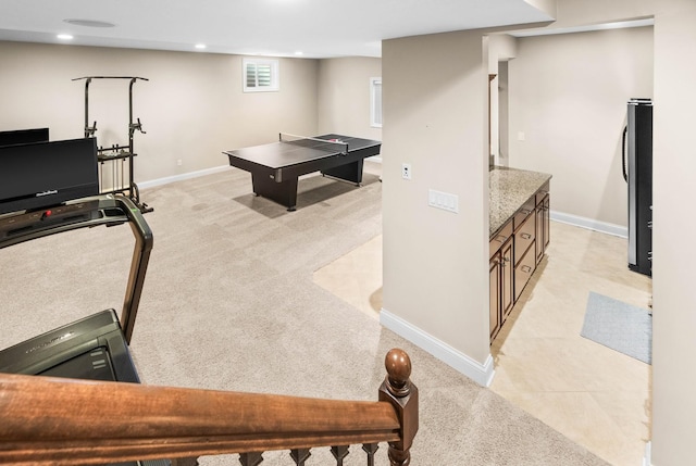 recreation room with recessed lighting, light colored carpet, visible vents, and baseboards