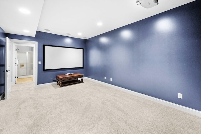 home theater room with recessed lighting, carpet, and baseboards