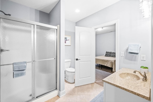 full bathroom with vanity, ensuite bath, a shower stall, and toilet