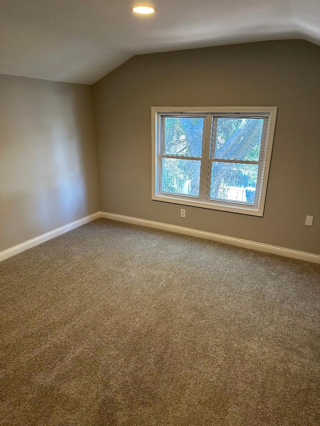 additional living space featuring vaulted ceiling, carpet floors, recessed lighting, and baseboards